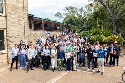 group shot of participants on stairs